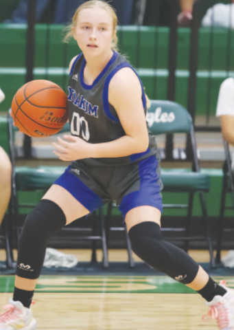 Yoakum High School Lady Bulldog Emma Fling (00) prepares to make a pass. Photo courtesy of Raymond Rosas.