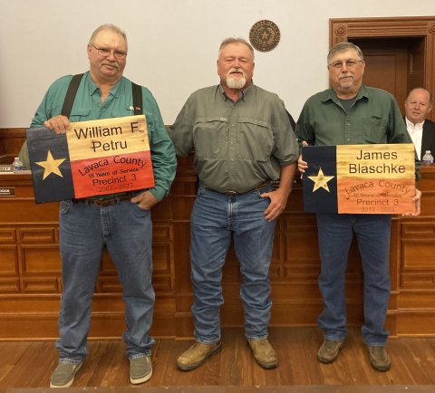 During the Friday, Dec. 22 Lavaca County Commissioners’ Court meeting, two employees for Pct. 3 were recognized for their retirement from the county. William F. Petru, a foreman for Pct. 3, has served the county for 16 years, while James Blaschke is retiring after 10 years of service. From left are Pilat, Pct. 3 commissioner Kenny Siegel and Blaschke. Photo by Jimmy Appelt