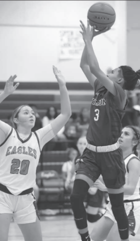 Jayla Hessler (3) attempts a shot at the basket during a recent basketball game. Photo courtesy of Raymond Rosas.