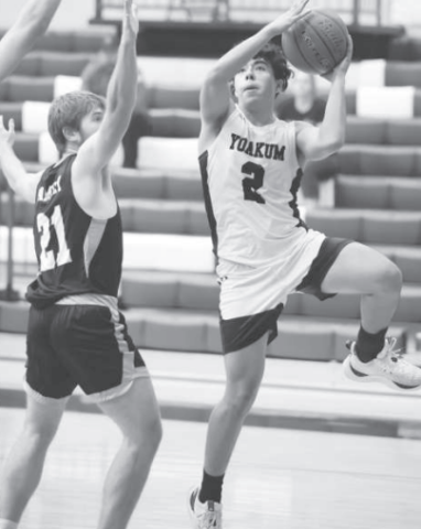 YHS Bulldog Isaac Martinez (2) shoots the ball. Photo courtesy of Raymond Rosas.