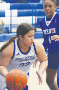 Aaliyah Wildey moves past a defender during the game against Tidehaven on Jan. 30. Photo courtesy of Raymond Rosas.