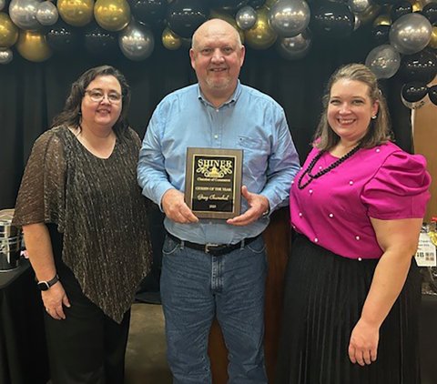 Shiner Chamber of Commerce named Greg Chumchal as Citizen of the Year. Pictured are, left to right, Chamber board member Christine Siegel, Greg Chumchal, and Chamber Executive Director Sarah Langhoff.