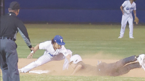 Trae Cuellar gets the Marion runner out during the game on Feb. 27. Photo courtesy of Raymond Rosas.
