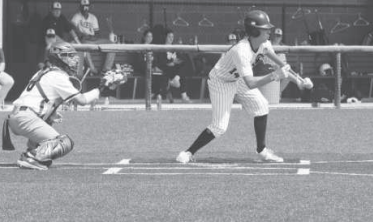 Kellen Mechura attempts a bunt in Friday’s Rice Consolidated game. Chuck Grafe/Tribune-Herald