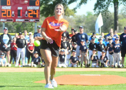 Rylee Trilcek, Hallettsville Alum., former pitcher University of Florida, threw out the first pitch this past Saturday to open up the little league season. photo by Charles Joseph Anthony Grafe