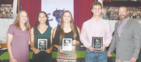 Pictured in the middle, from left, are the Athletes of the Year named at the Sports Award Ceremony Sunday night at the KC Hall. Kasey Harper, Layten Kolacny and Layne Gerke. At left is Girls Athletic Coordinator, Callie Kresta and right is AD Levi Montgomery. Chuck Grafe/Tribune-Herald