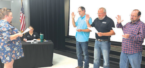 Three board members did the oath of office for the renewal of their term. From left to right is Place 7 Justin Anderle, Place 6 Daniel Beyer, and Place 4 Chuck Greive