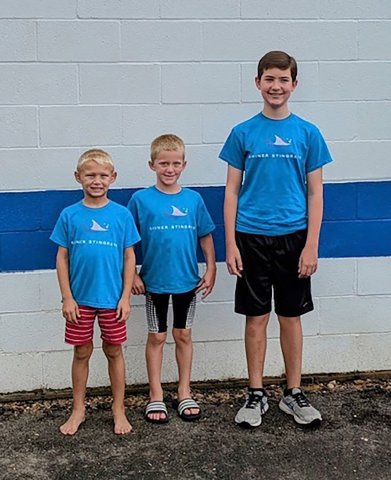 Pictured are State qualifiers Maston Davis, Charlie Park, and Pierce Wallace (left to right). They were the only three of the 23 Shiner Stingray Swim Team members who advanced to State.
