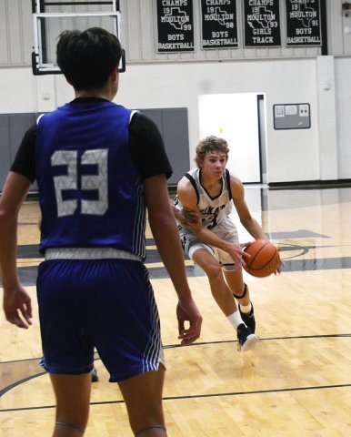 Landon Chaloupka attacks the lane during the first half. Photo by Mark Lube.