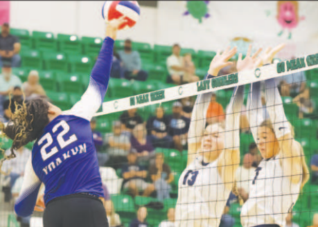 Senior Amori Harper gets a kill to tie the game 21-21. Photo courtesy of Raymond Rosas.