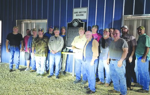 Pictured are members of the Shiner Game and Fish Protective League and Doug Kubicek with the new historical marker at the Game and Fish Building.