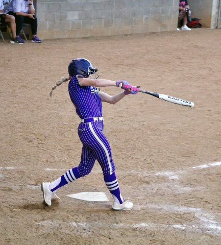 Jo Caka takes a swing on Friday against Weimar. She had two hits and scored one run, and stole one base. Photo courtesy of Louann Heinsohn.