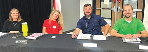 Pictured from left to right are newly appointed board members Sherry Fishbeck, Jill Moore, Cody Maresh and Jordan Dees. Photo by Clayton Kelley