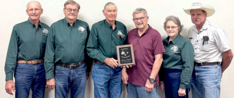 Hallettsville resident Jimmy Appelt was presented the 2025 Lavaca County Friend of Conservation award by the Lavaca Soil and Water Conservation District (SWCD). The award presentation took place at the LSWCD board meeting held Wednesday morning, June 11. From left are LSWCD board members Mike Hanslik, James Steffek, Dennis Haas, Appelt, Dorothy Henke and Wayne Rother. Photo by Jessica Jansky