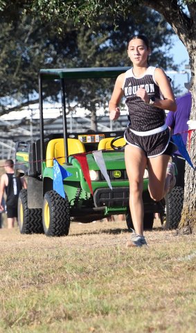 Addyson Grieve (left) had a time of under 15 minutes at Shiner on Saturday. Photo by Mark Lube.