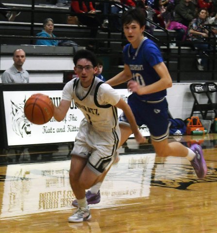 Bryan Fernandez attacks the basket in the second half against Sacred Heart. He notched six points on two triples. Photo by Mark Lube.