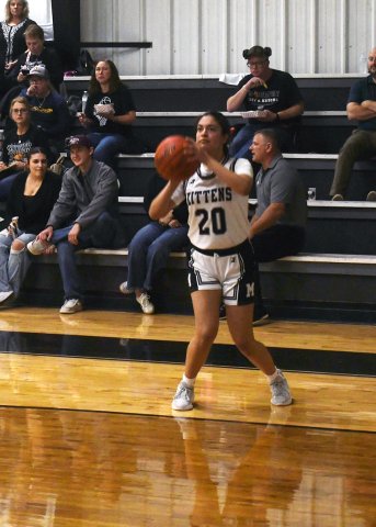 Araceli Vasquez prepares to shoot a third-quarter shot on the way to reaching 1,000 career points. Photo by Mark Lube.