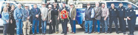 Lavaca County EMS recently announced it is now able to carry and administer low-tier O-positive whole blood in the field, allowing paramedics to begin blood transfusions before a patient arrives at the hospital. The advancement significantly improves survival chances for patients experiencing severe traumatic hemorrhage. Pictured are Lavaca County Commissioners, the District and County Clerk, County Judge Keith Mudd and EMS employees. Contributed photo
