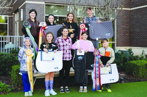 Pictured are, top row, left to right, Grace Nevlud, Dani Starkey, Hattie Cinadr and Cade Shimek; bottom row, left to right, Avery Starkey, Dawsyn Shimek, Samantha Starkey, Aubrey Nevlud and Holdyn Nevlud.