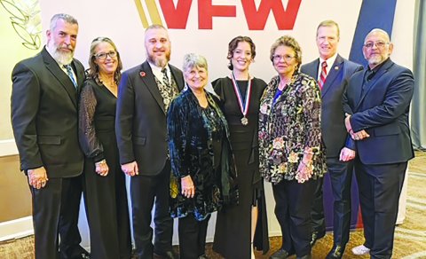 Pictured, left to right, Michael Collins, Sarah Collins, Dave Walden (Texas VFW Commander), Barb Koehn (District 24 Auxiliary President), Madeline Collins, Barbara Hartman (District 24 Auxiliary Secretary and the Auxiliary Scholarship Chair),  Kenneth O. Preston (13th SMA(R)) and Andy Rosales (District 24 Commander).