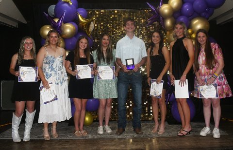 2025-2026 Cheerleader Beau. Beau is Chase Malinovsky (fourth from right). Also shown is MaKenna Pish (left), Olivia Akin (second from left), Kacy Kramer (third from left), Bianca Rainosek (fourth from left), Tawni Shelton (third from right), Addy Siegel (second from right) and Valerie Bordovsky (right). Photo by Mark Lube.