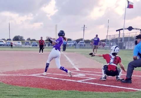 Ally Trojcak at the plate against Palacios on Sunday. She was a combined  6-for-11 with four runs and two stolen bases against Needville and Palacios. Photo courtesy of Keri Mikulencak.