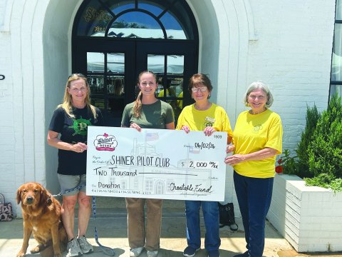 Pictured are, left to right, Brew (Shiner’s Mascot), Lisa Stafford, Lauren Petras, Betty Petras and Kathy Kofron.
