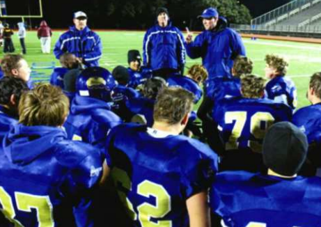 Coach Steven Cerny talks to his Comanche football team following a game played in 2013. Photo courtesy of Steven Cerny