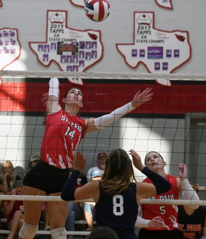 Ashlin DeSarro is about to make a kill attempt in the Aug. 11 3-2 win over Georgetown Grace Academy. Photo by Mark Lube.