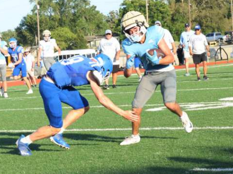 Photo by Chuck Grafe Freshman Konnor Chance comes up to make a tackle in the scrimmage.