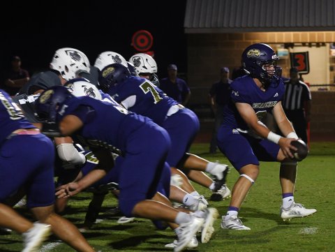 Levi Werner executes an offensive play during Shiner’s home game with Industrial Aug. 28. Shiner will be home for the next two games. Photo by Mark Lube. 