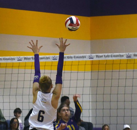 Kendyl Boehm attempts a block during Shiner’s district opener with Weimar at home on Sept. 8. 