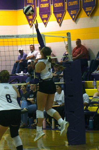 Taylor Kocian makes a play for the ball at the net during Shiner’s three-set win over Ganado Sept. 22 at home. Photo by Mark Lube.