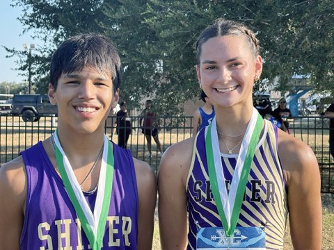 Joshua Lecon (left) placed No. 20 in the boys varsity and Addison Tudyk was No 13 in girls varsity for Shiner in the Cuero Invitational meet. Photo courtesy of Michelle Winkenwerder.