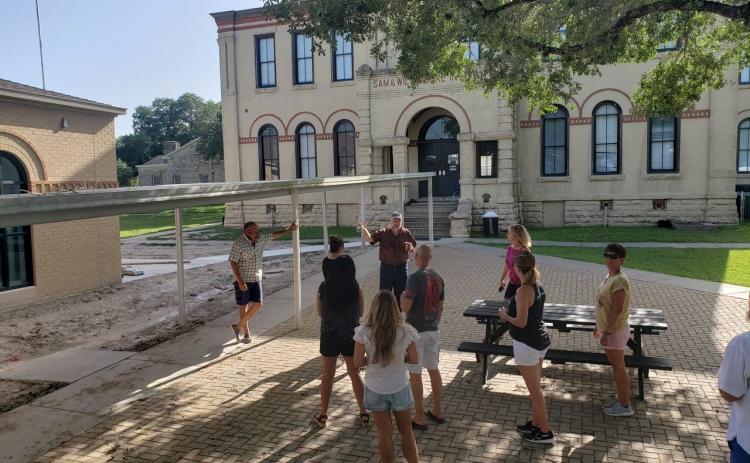 A tour group checks out the Moulton school construction a year ago.