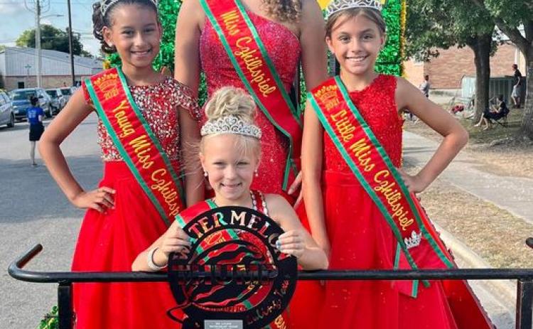 Flatonia girls take first at Luling's Watermelonm Thump parade.