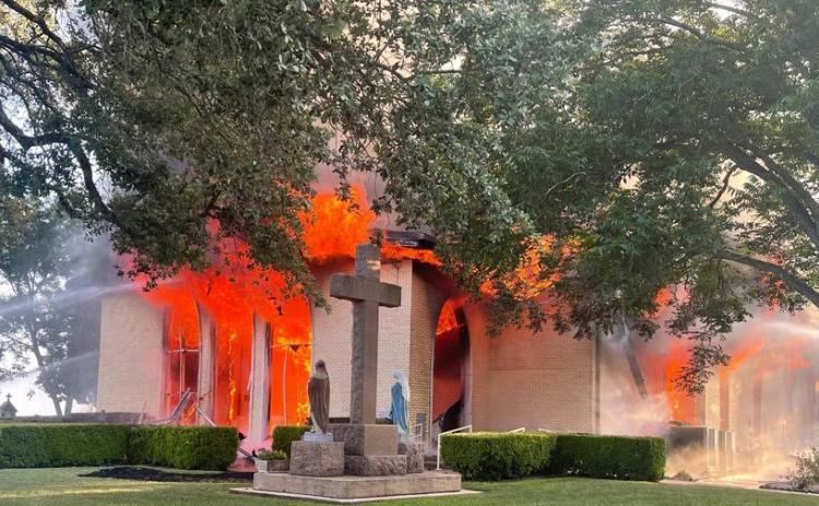 Flames and smokefrom the Hostyn church fire were reported from as far away as Fayetteville.