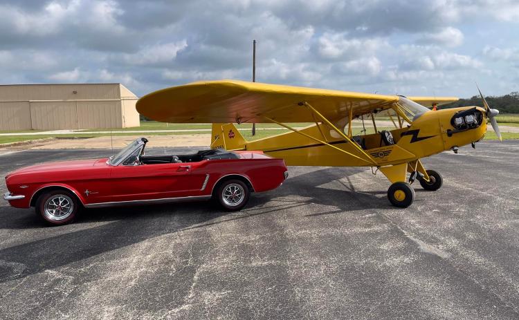 That red classic 1965 Ford Mustang under the wing of that bright yellow Piper Cub could be yours if you wind up being the lucky winner of the Hallettsville Barnstormers’ drawing. Only 2,000 tickets will be sold, with proceeds going to help fund scholarships to local graduates looking to the fields of aviation.