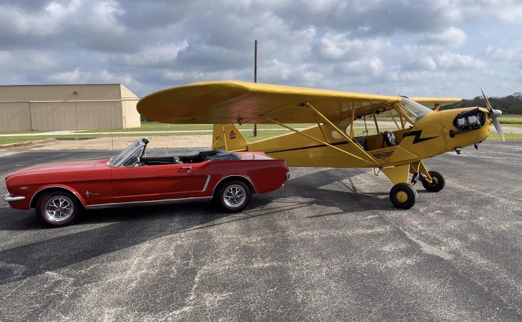 That red classic 1965 Ford Mustang could be yours if you wind up being the lucky winner drawn, as the Texas Barnstorming Museum hosts its 8th Fly-In and Model T owners from across the nation converge at the local airport Saturday, Oct. 1. 