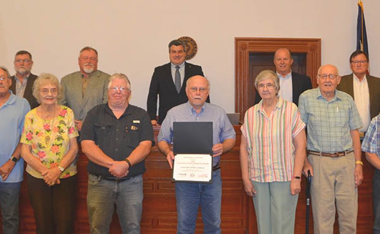 The LCHC was one of 83 county historical commissions throughout the state to be honored. From left are members of the LCHC including Nancy Obelgoner, Roger Ramey, Bea Wyatt, Duff Wagner, Doug Kubicek (chairman), Irene Szwarc, Harvey Matusek, Bob Morgenroth and Dennis Svetlik. Back row from left include members of the Commissioners’ Court including commissioners Dennis W. Kocian, Kenny Siegel, judge Keith Mudd and commissioners Wayne Faircloth and Edward Pustka. Photo by Jimmy Appelt