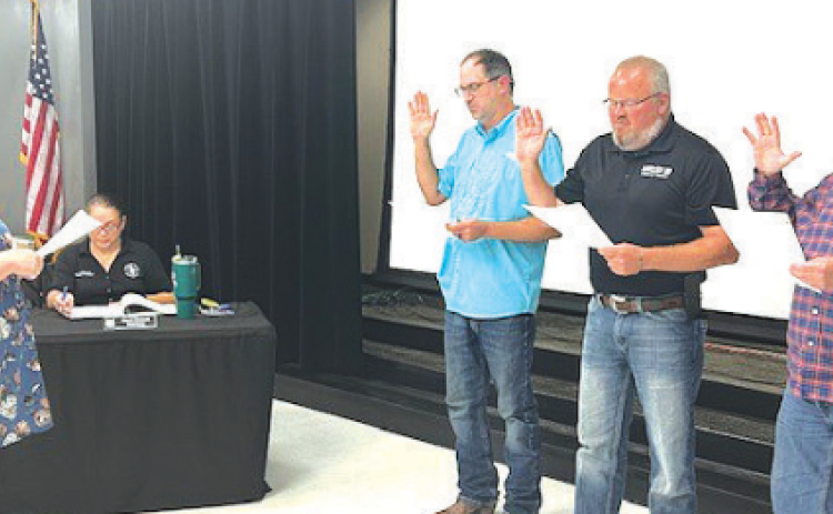 Three board members did the oath of office for the renewal of their term. From left to right is Place 7 Justin Anderle, Place 6 Daniel Beyer, and Place 4 Chuck Greive