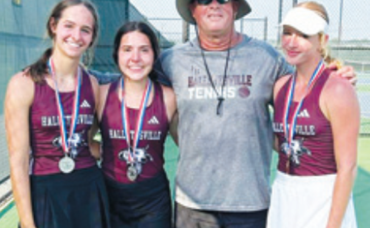 From left, Olivia Etzler and April Leopold advanced to state in doubles, coach John Hoelter and alternate to state, Breylon Swoboda. Contributed photo